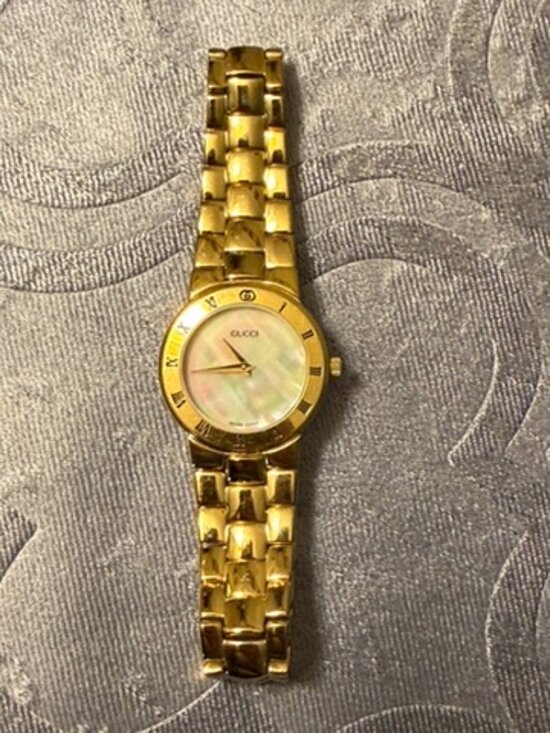 Gucci 3300.2.M watch with Mother of Pearl face.